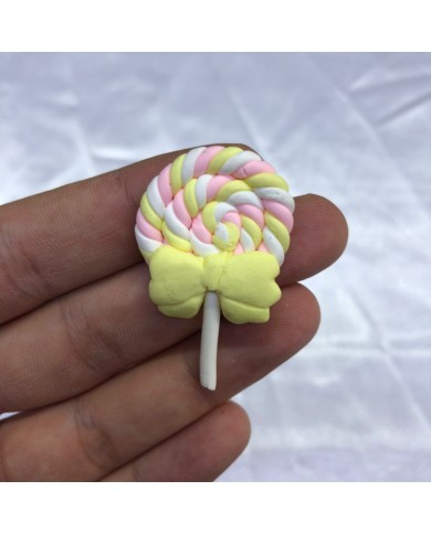 Pastel Pembe Sarı Beyaz Sarı Fiyonklu Spiral Lolipop Figürü 1