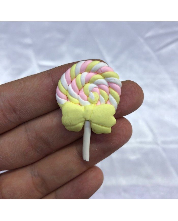 Pastel Pembe Sarı Beyaz Sarı Fiyonklu Spiral Lolipop Figürü 1